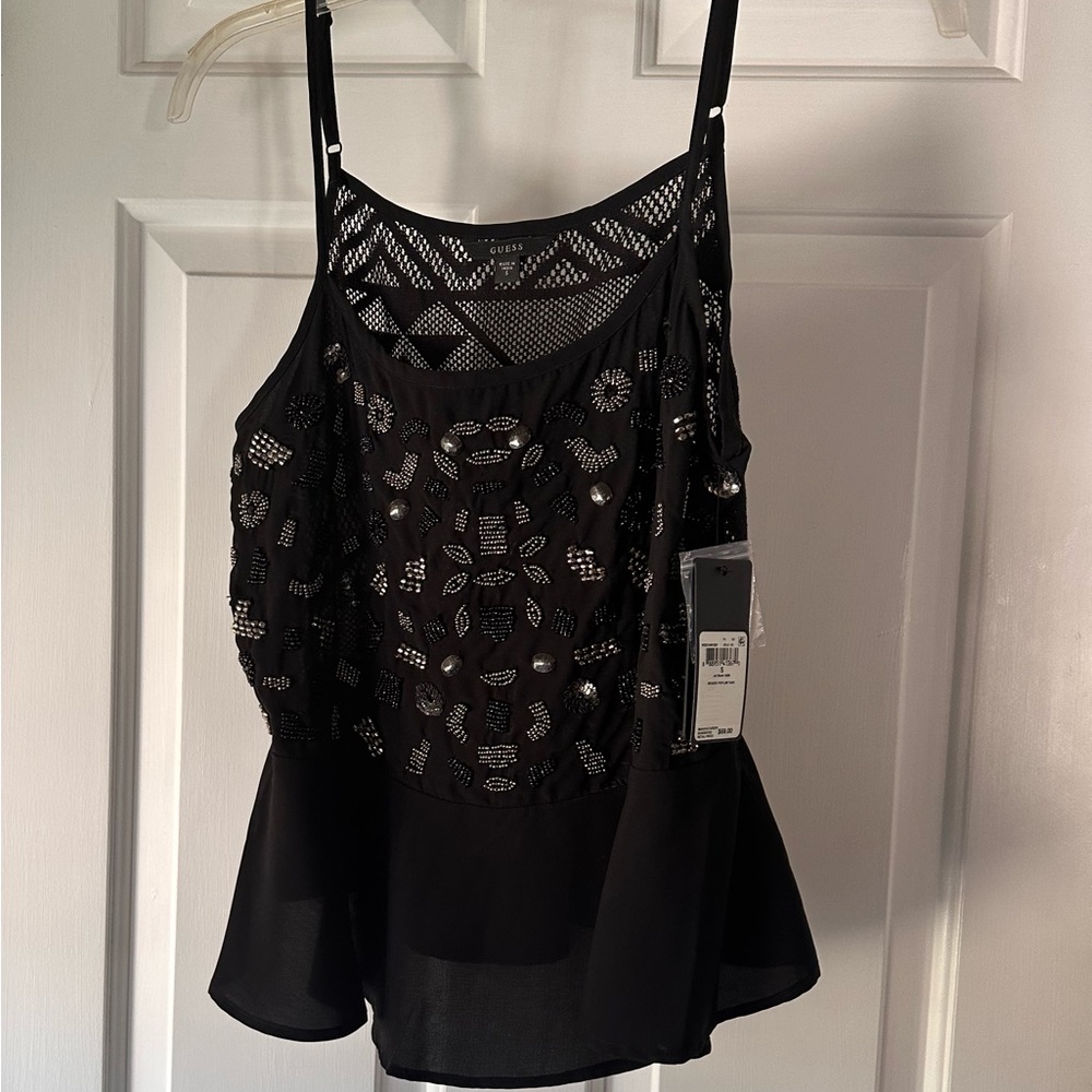 Beautiful Guess top with peplum bottom and pretty detailed beading!🌸
